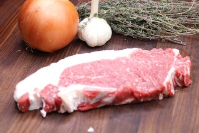Strip steak beef grass-fed Angus (also called New York strip or Kansas City steak) Strip steak beef grass-fed Angus (also called New York strip or Kansas City steak)