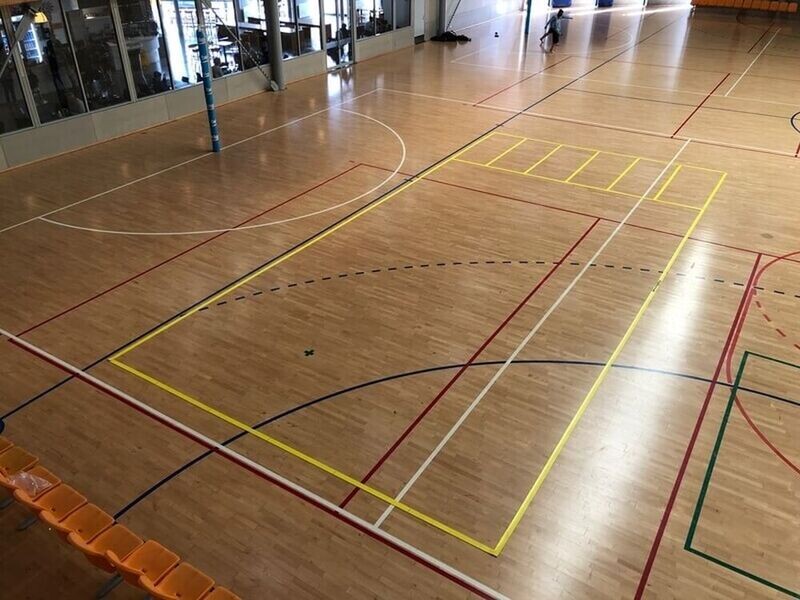 Temporary line markings laid out for boccia in a recreation centre