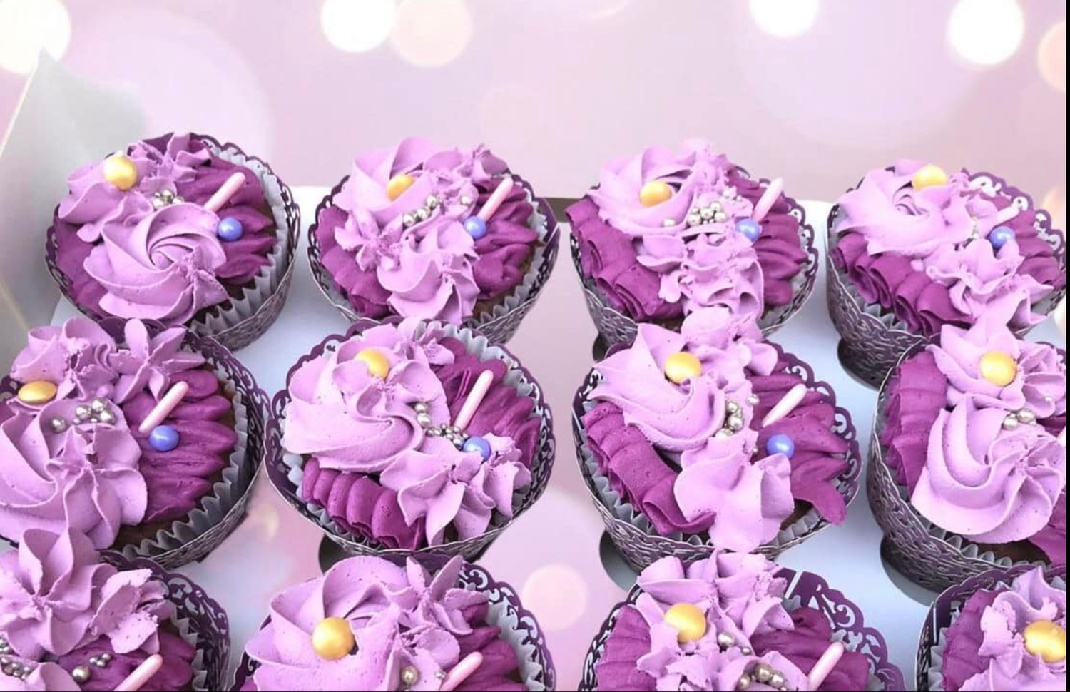 12 x vanilla cupcakes in mauves with sprinkles