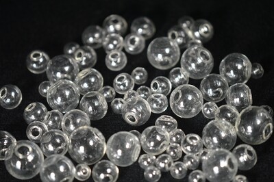 Glass Orbs for Liquid Cores