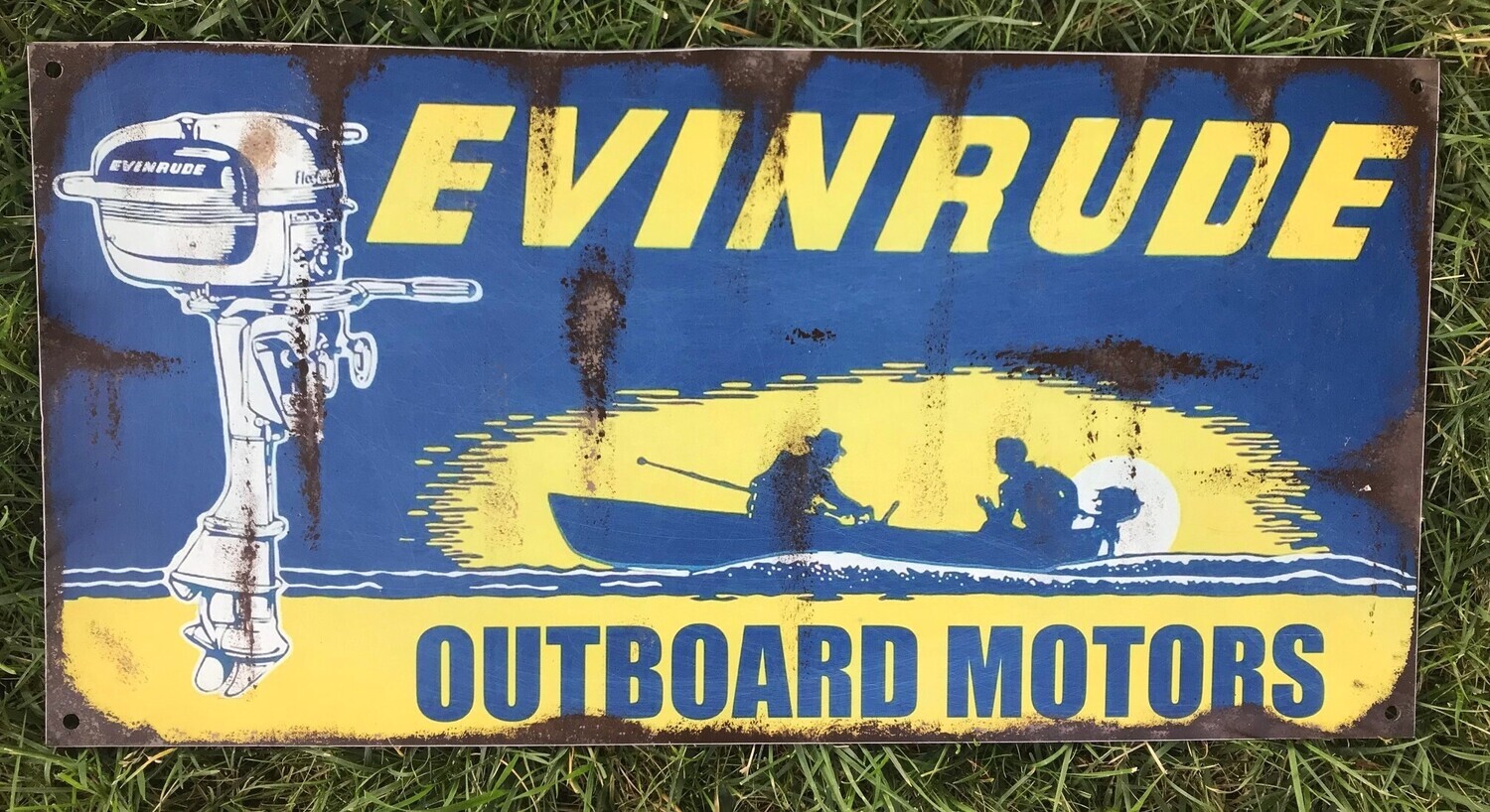Weathered EVINRUDE OUTBOARD SIGN