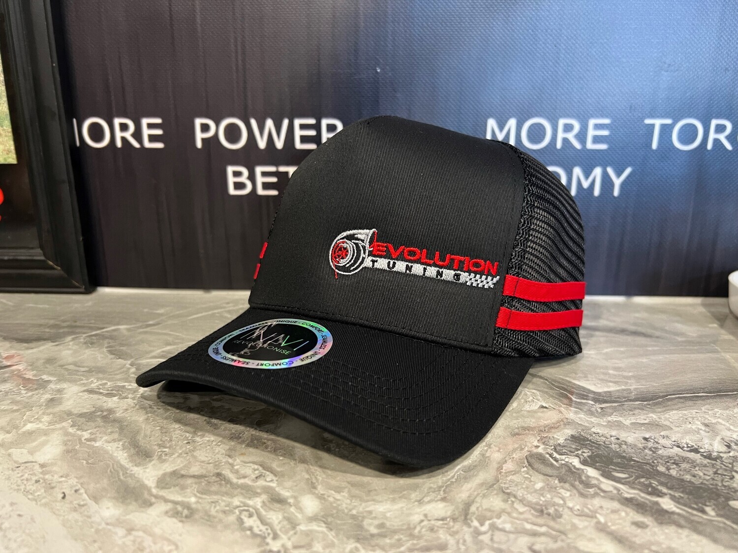 Black Evolution Trucker Cap