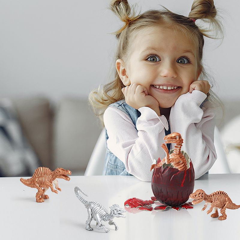 Dinosaur skeleton hatching egg