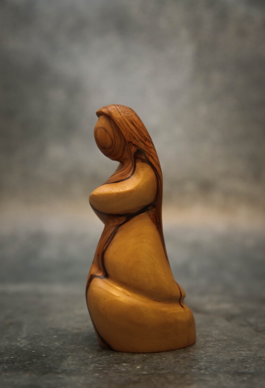 Woman in prayer - Olive Wood
