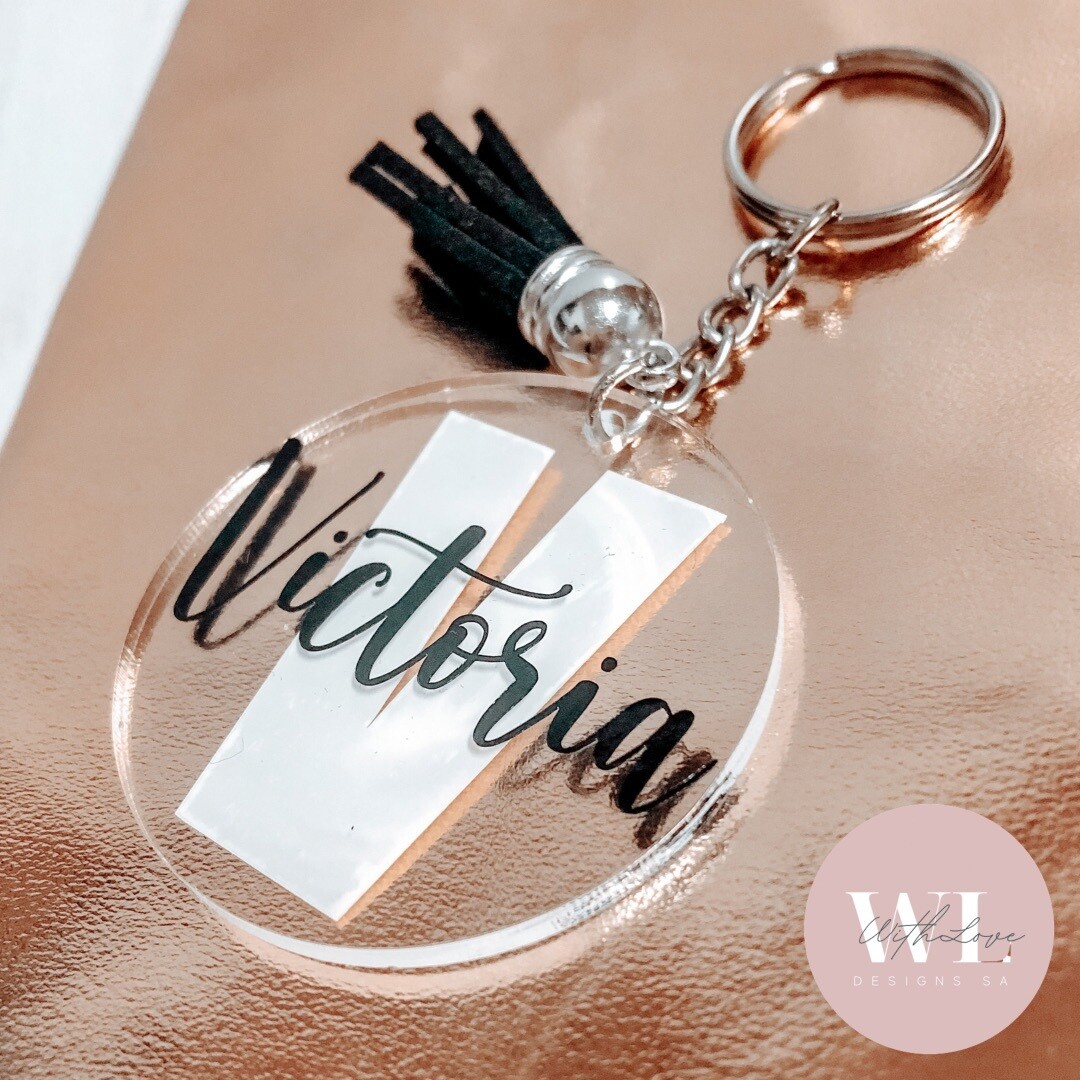 Silver Key Chain &amp; Black Tassel