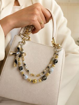 Black and Gold Cross Beaded Purse Charm with Pearl-Like Accents