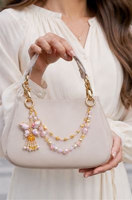 Pink Butterfly Beaded Purse Charm with Gold-Tone Tassel Accent