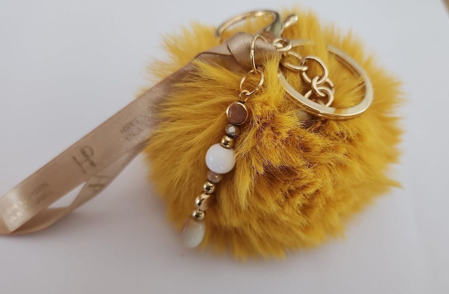 HIP-Sleutelhanger Pompon- Oker geel