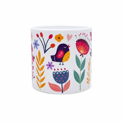 Wit kopje met kleurrijke vogel- en bloemenillustratie uit de kopjescollectie van EchtMiek