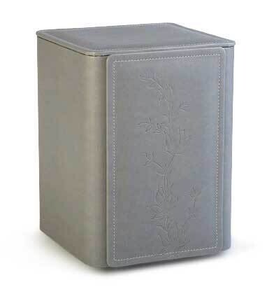 Grey artificial leather cinerary urn with flower decoration