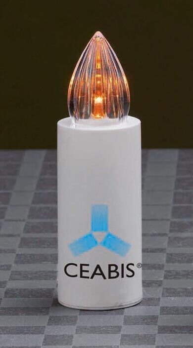 Disposable yellow votive lamp with intermittent light