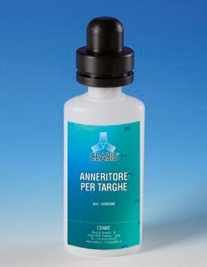 Bottle with blackener fluid for plates