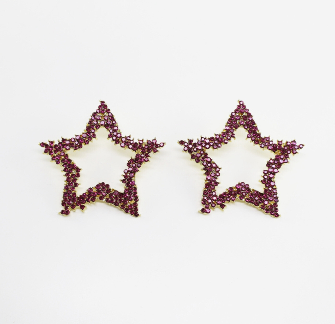 Pendiente estrella rosa