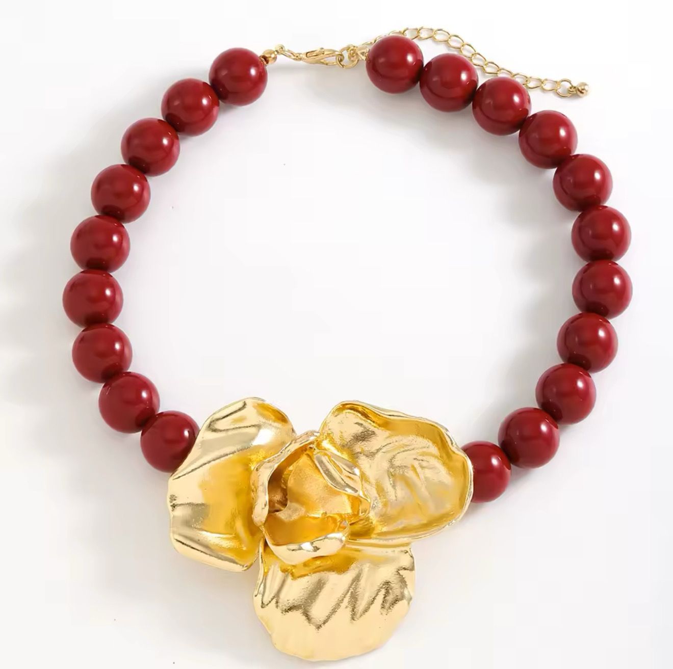 Collar flor dorada