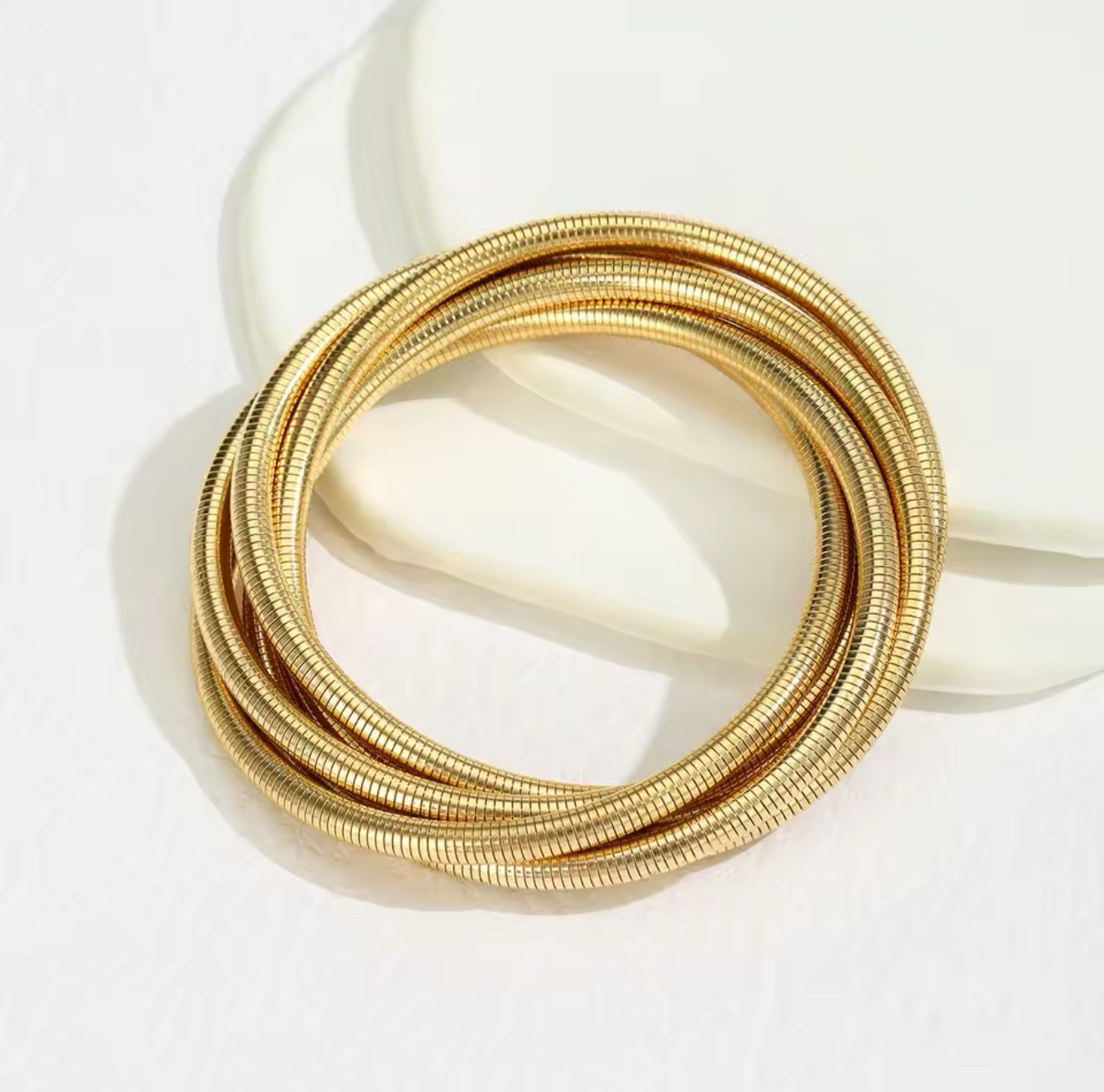 Pulsera triple dorada