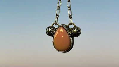 Pink conch tear drop