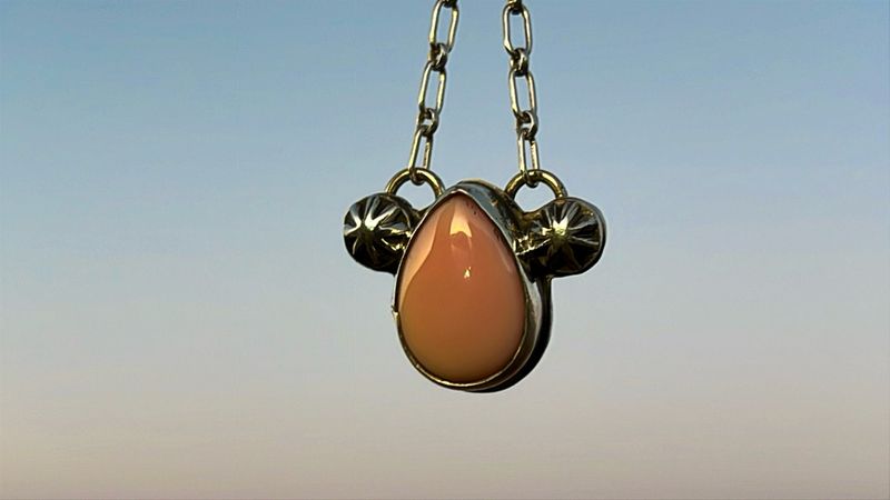 Pink conch tear drop