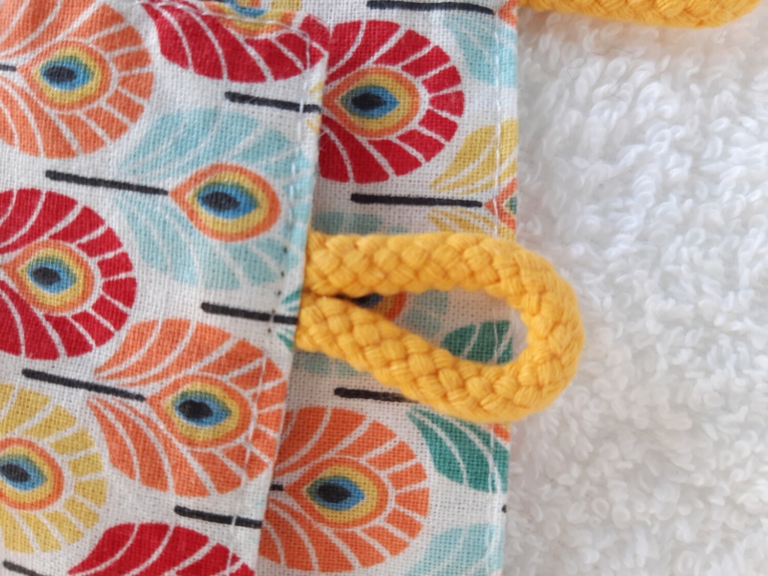 Zoom sur le cordon d’accroche des serviettes lavables Swan