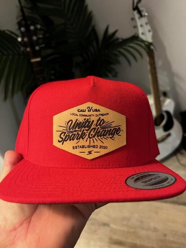 Red, Classic Snap Back.  Flat Bill with Custom Leather Patch