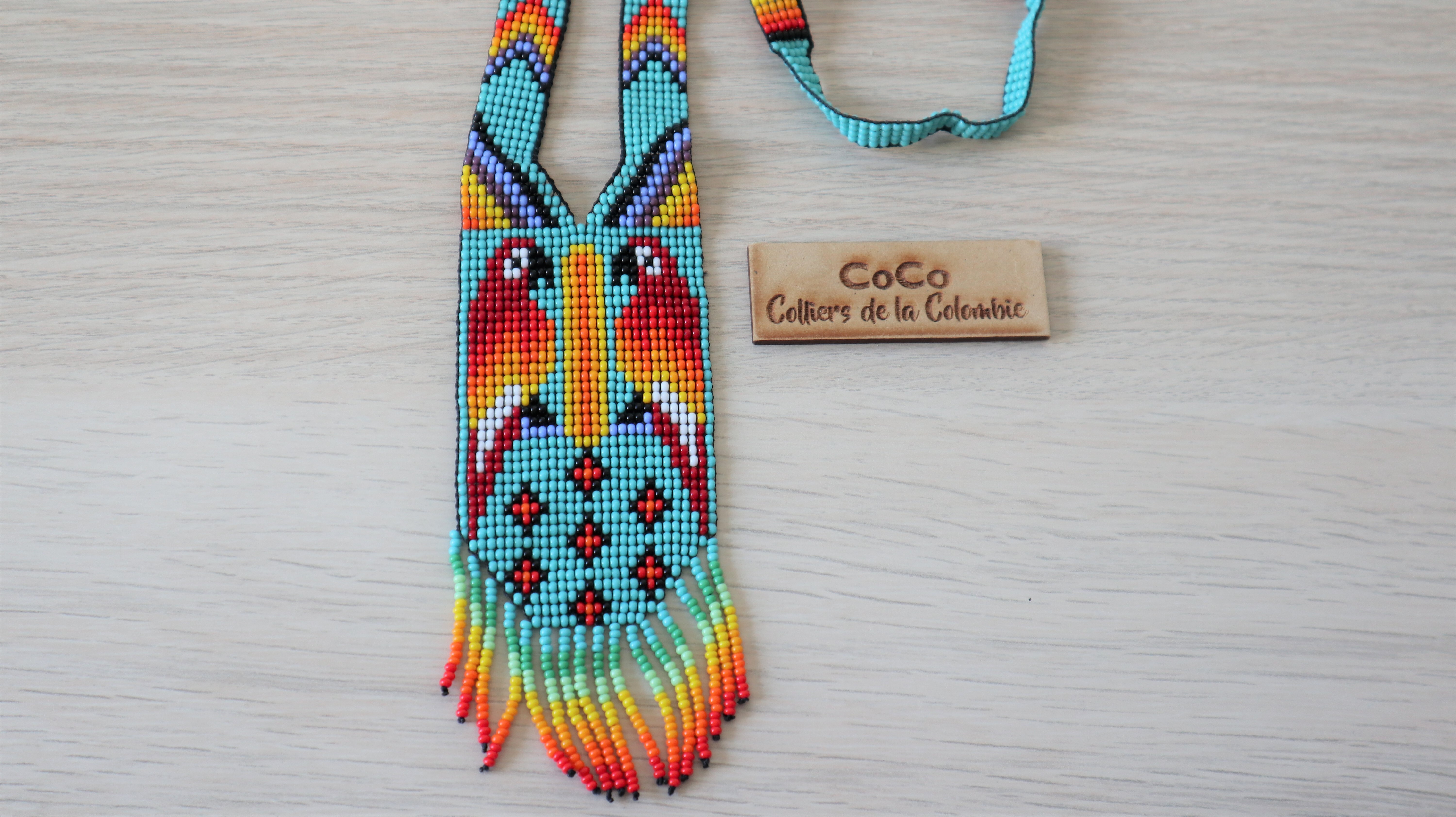 Collier perroquets bleu clair