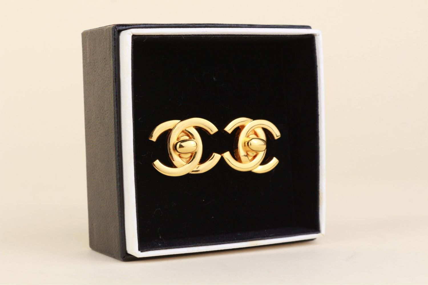 ​Chanel Clip on turnlock earrings gold