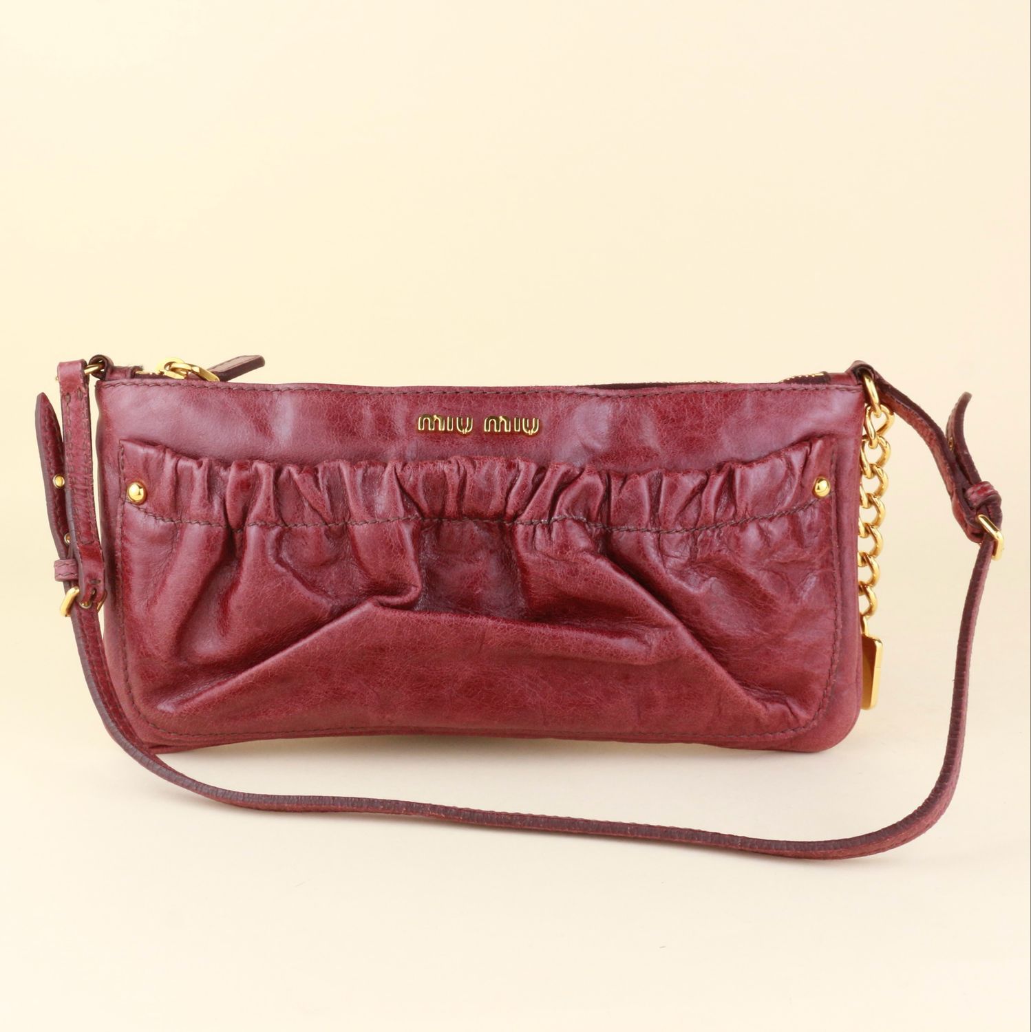 ​Miu Miu Burgundy Shoulder Bag with Gold Hardware