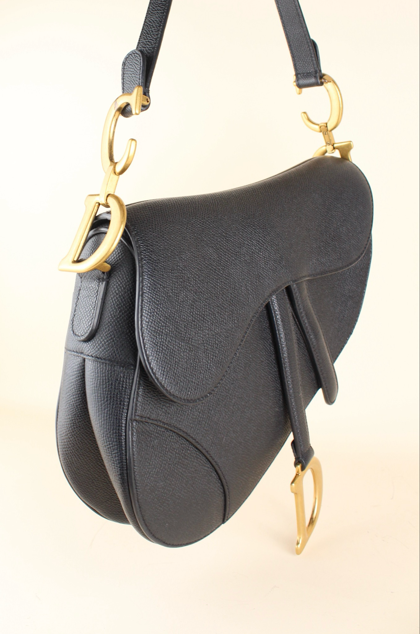 Dior Saddle Bag and Guitar strap