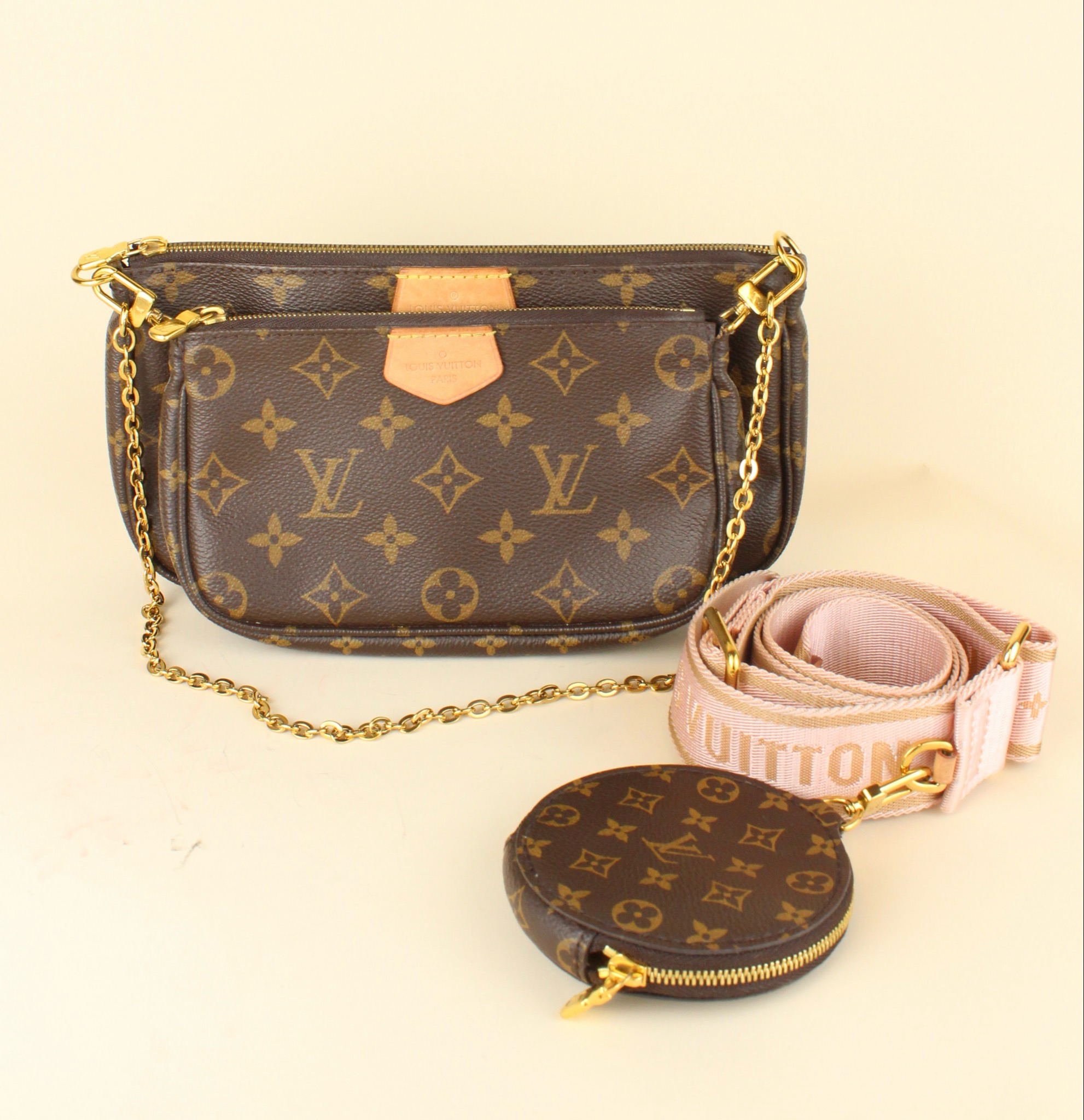 Multi Pochette with pink strap