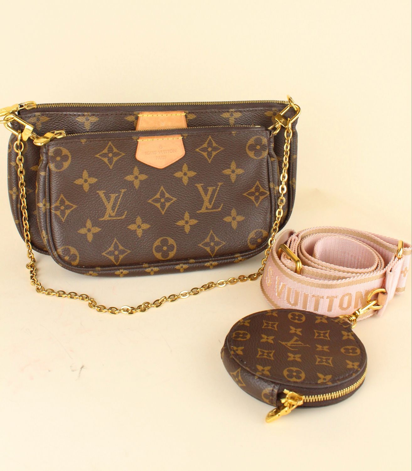 Multi Pochette with pink strap