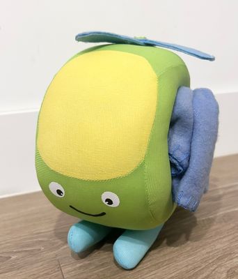 Peluche helicóptero con manta