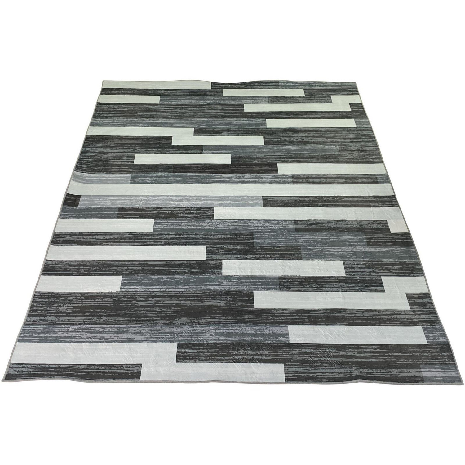 Alfombra gama blanco, grises y negro