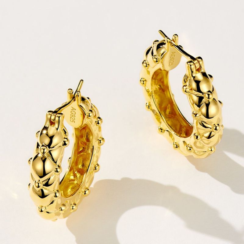 Vintage rhombic golden earrings