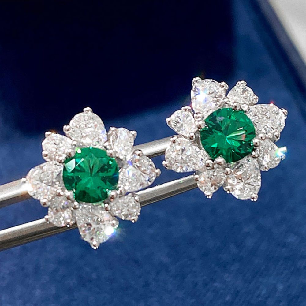 Green teardrop-encrusted gemstone earrings