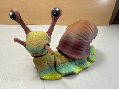 Snorble – Articulated Snail Buddy (Shell, Pumpkin, Skull, or Ornament Variants)