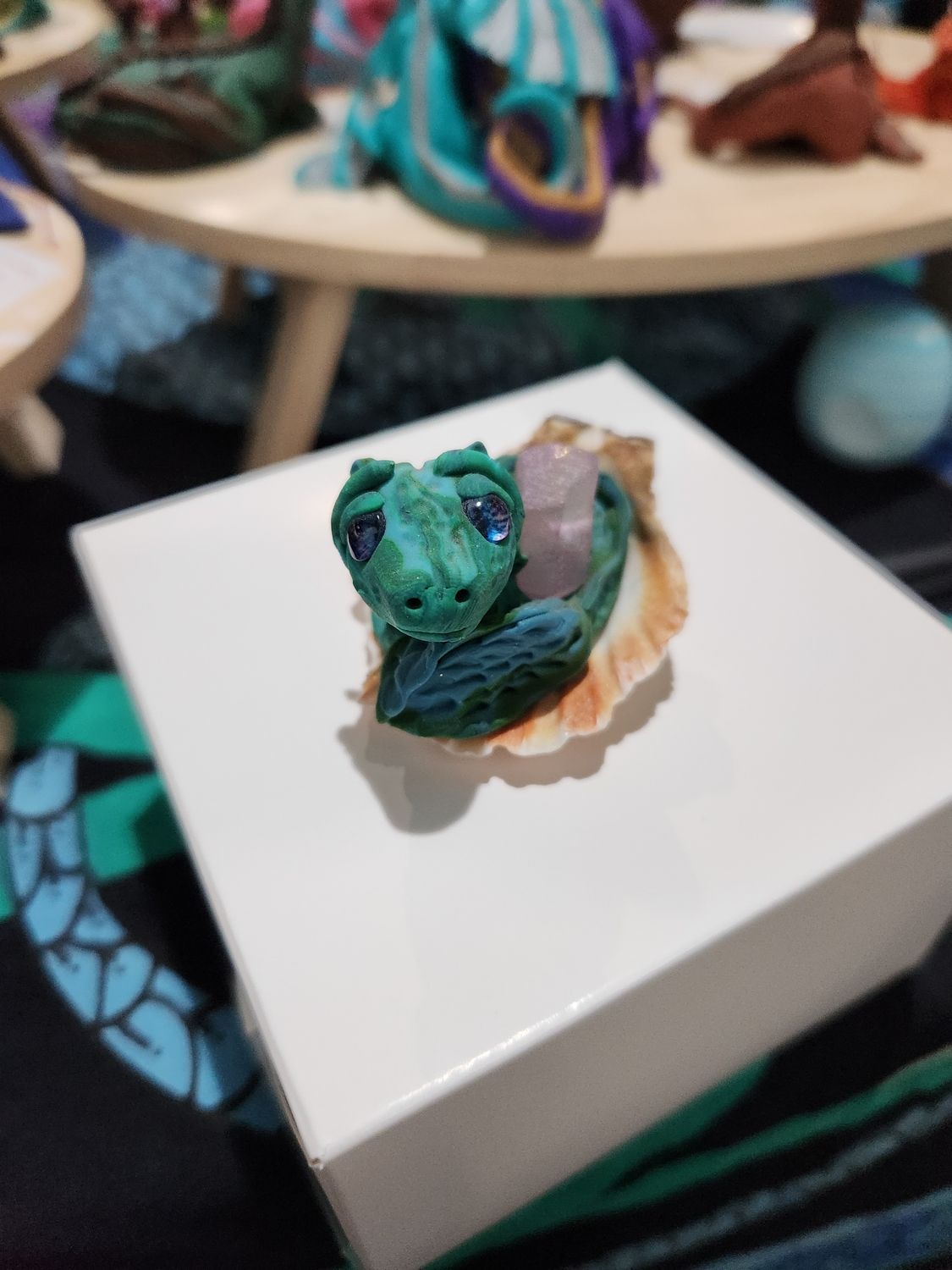 Juvenile water dragon with amethyst (marbled green)