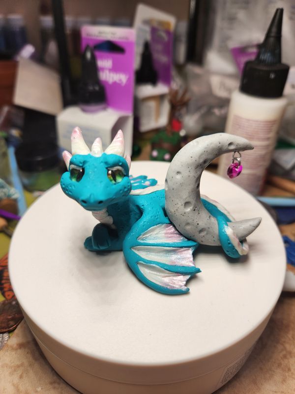 Celestial dragons with moons