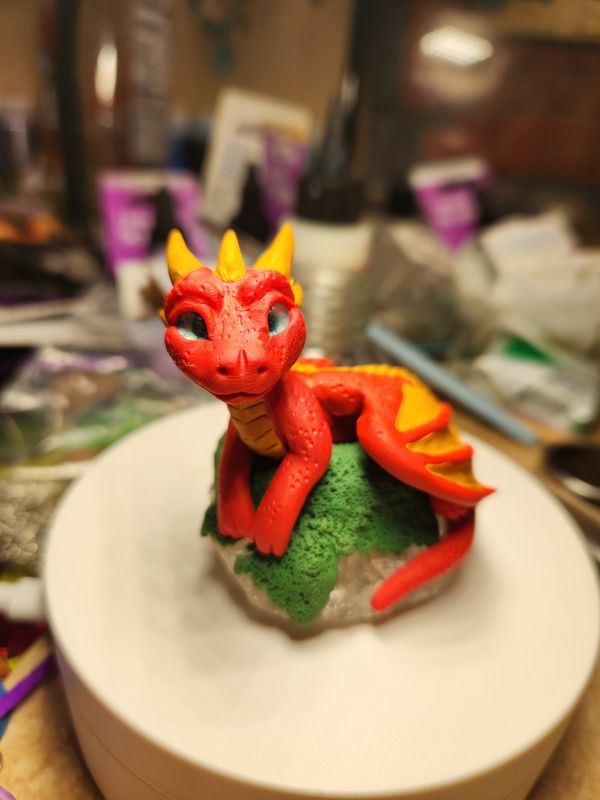 Red dragon on crystal shard