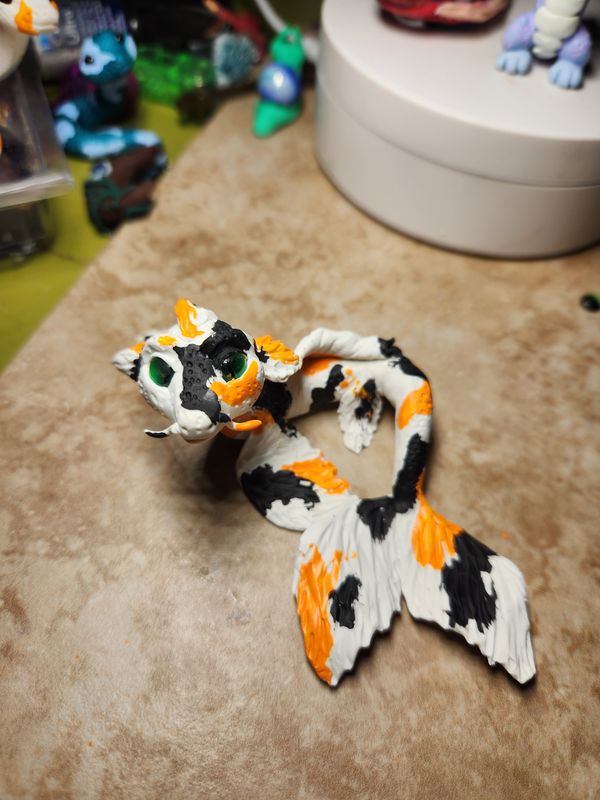 Koi scaled water dragon