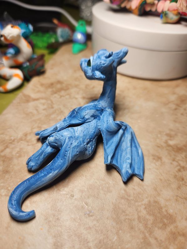 Blue scale adult dragon