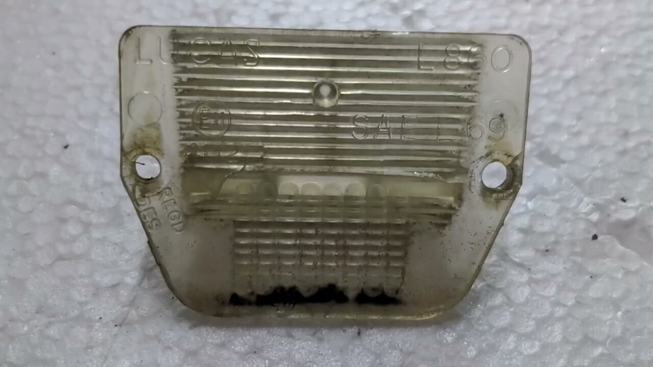 80 to 98 ROLLS ROYCE SILVER spur spirit dawn 1 rear LICENSE PLATE LIGHT LENS