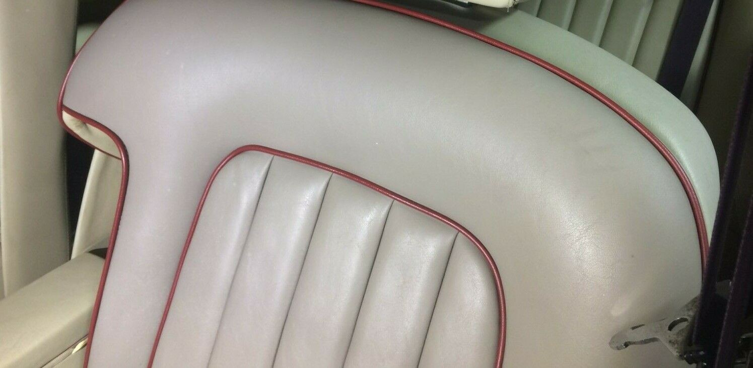 70 to 80 ROLLS ROYCE SILVER SHADOW left front seat cream and red piping