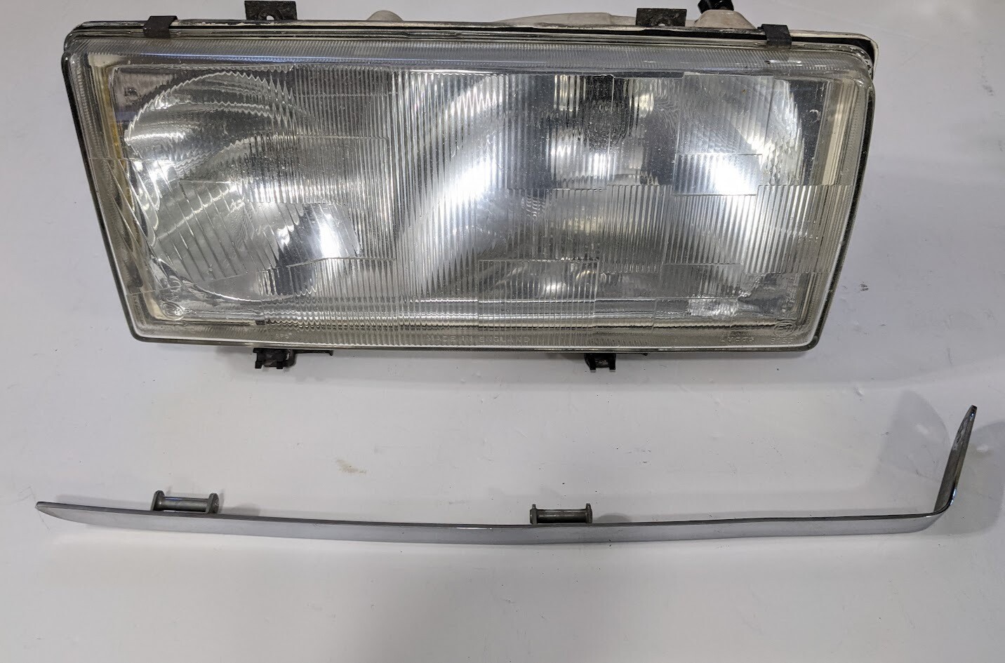 ROLLS-ROYCE SILVER SPUR FRONT LEFT SIDE HEAD LIGHT EUROPEAN STYLE with lower bezel pre-owned
