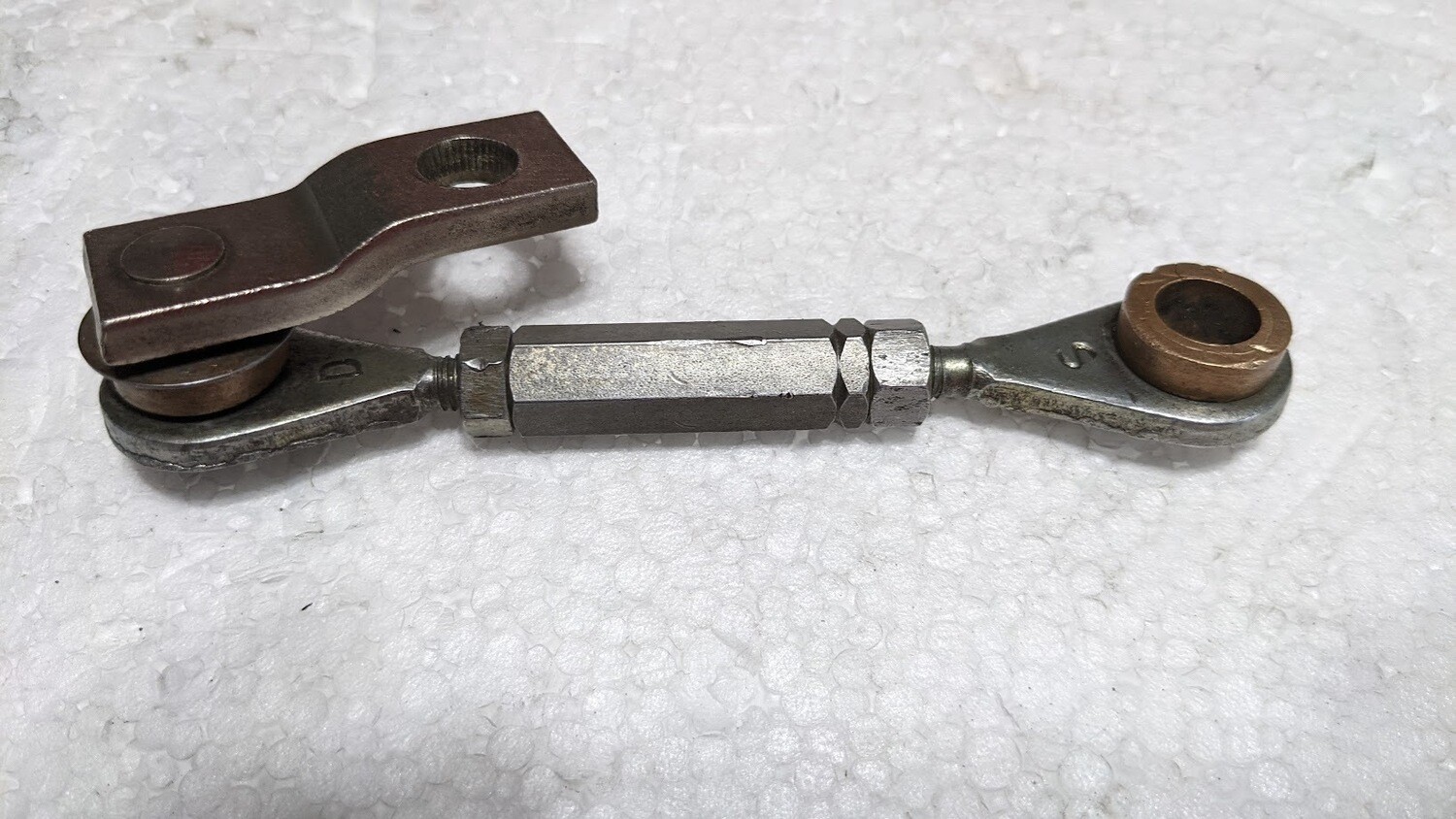 FERRARI 308 GTSi LEFT HEADLIGHT CARRIER TO MOTOR ROD 61268600