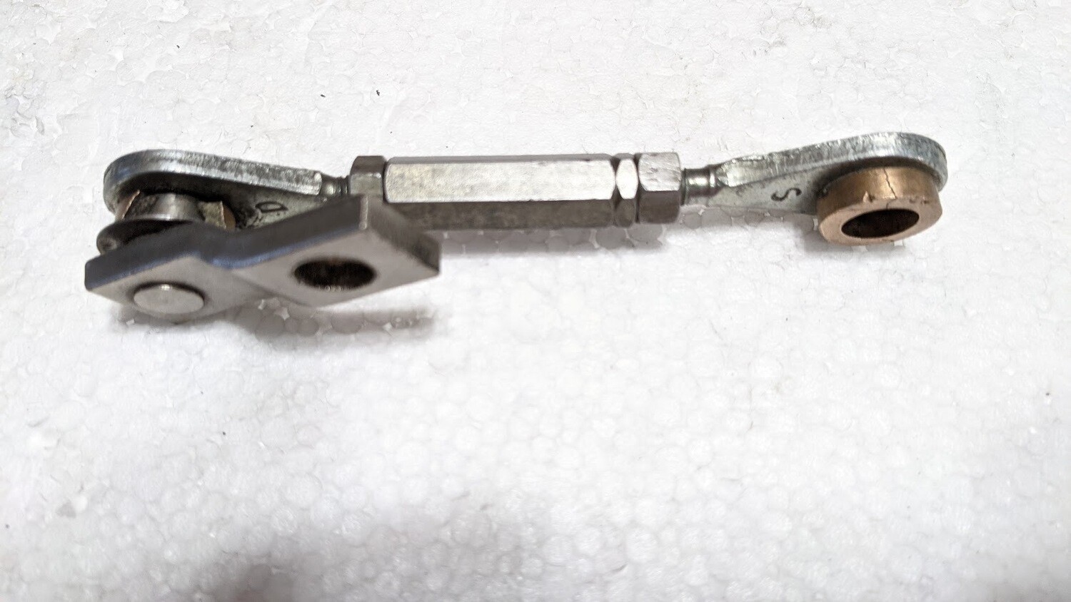 FERRARI 308 GTSi LEFT HEADLIGHT CARRIER TO MOTOR ROD 61268600