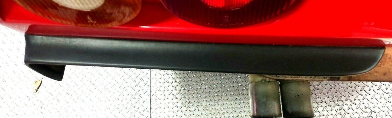 FERRARI 308 GTSi REAR BUMPER USA MODEL LEFT GUARD MOULDING EYEBROW