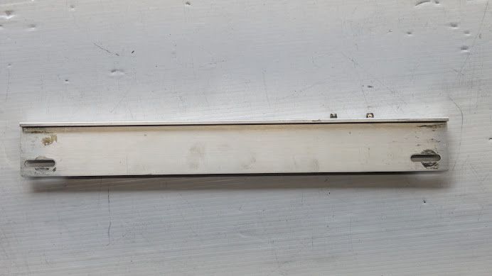 FERRARI 456M LEFT   DOOR ROLL UP GLASS HORIZONTAL GUIDE 65778100