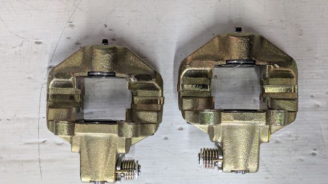 FERRARI 308 81 USA PARTS RIGHT AND LEFT REAR BRAKE CALIPER NEW 106360 106359 SET