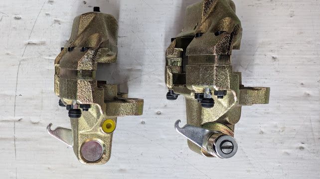 FERRARI 308 81 USA PARTS RIGHT AND LEFT REAR BRAKE CALIPER NEW 106360 106359 SET