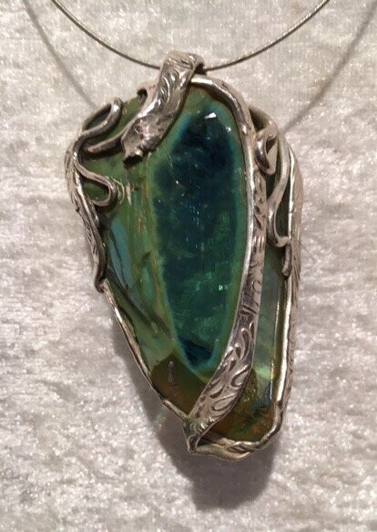 Blauw groen glas in zilver