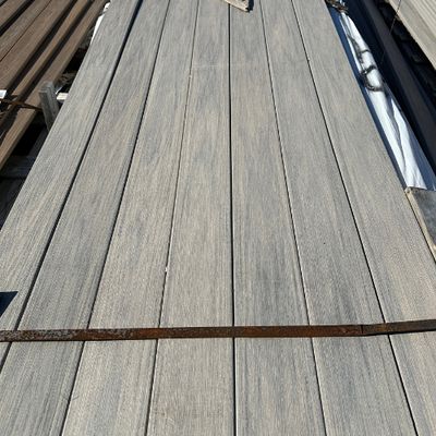 WOLF 1 in. x 6 in. x 20 ft. Square Edge PVC Deck Board - Silver Teak (Warehouse Seconds) WOLF 1 in. x 6 in. x 20 ft. Square Edge PVC Deck Board - Silver Teak (Warehouse Seconds)